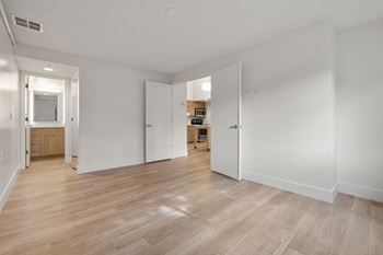 Room with white walls and door